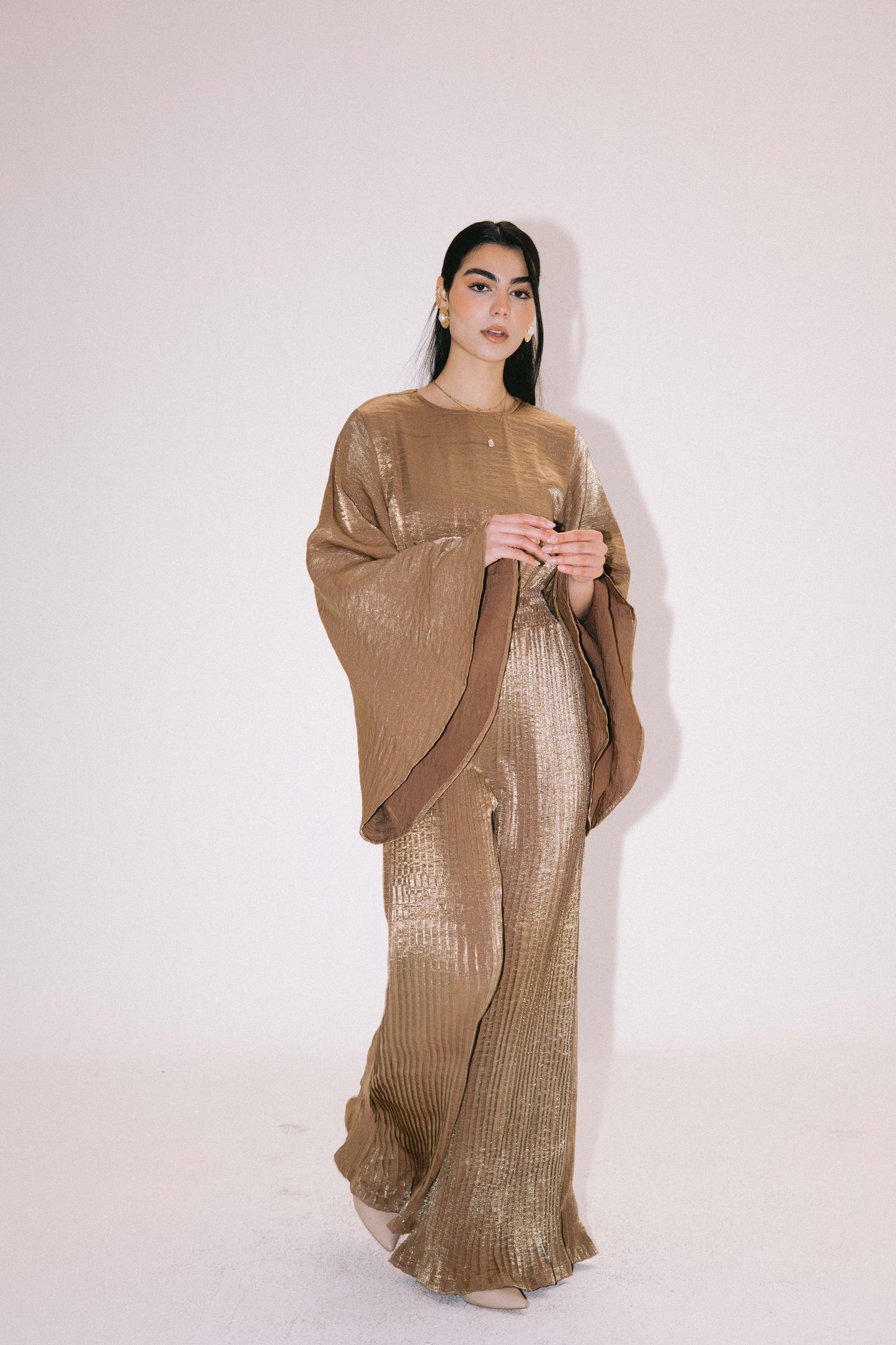 Glimmer Jumpsuit in Gold