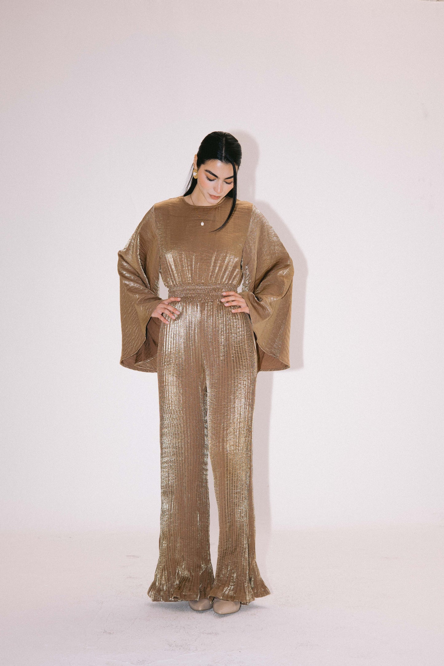 Glimmer Jumpsuit in Gold