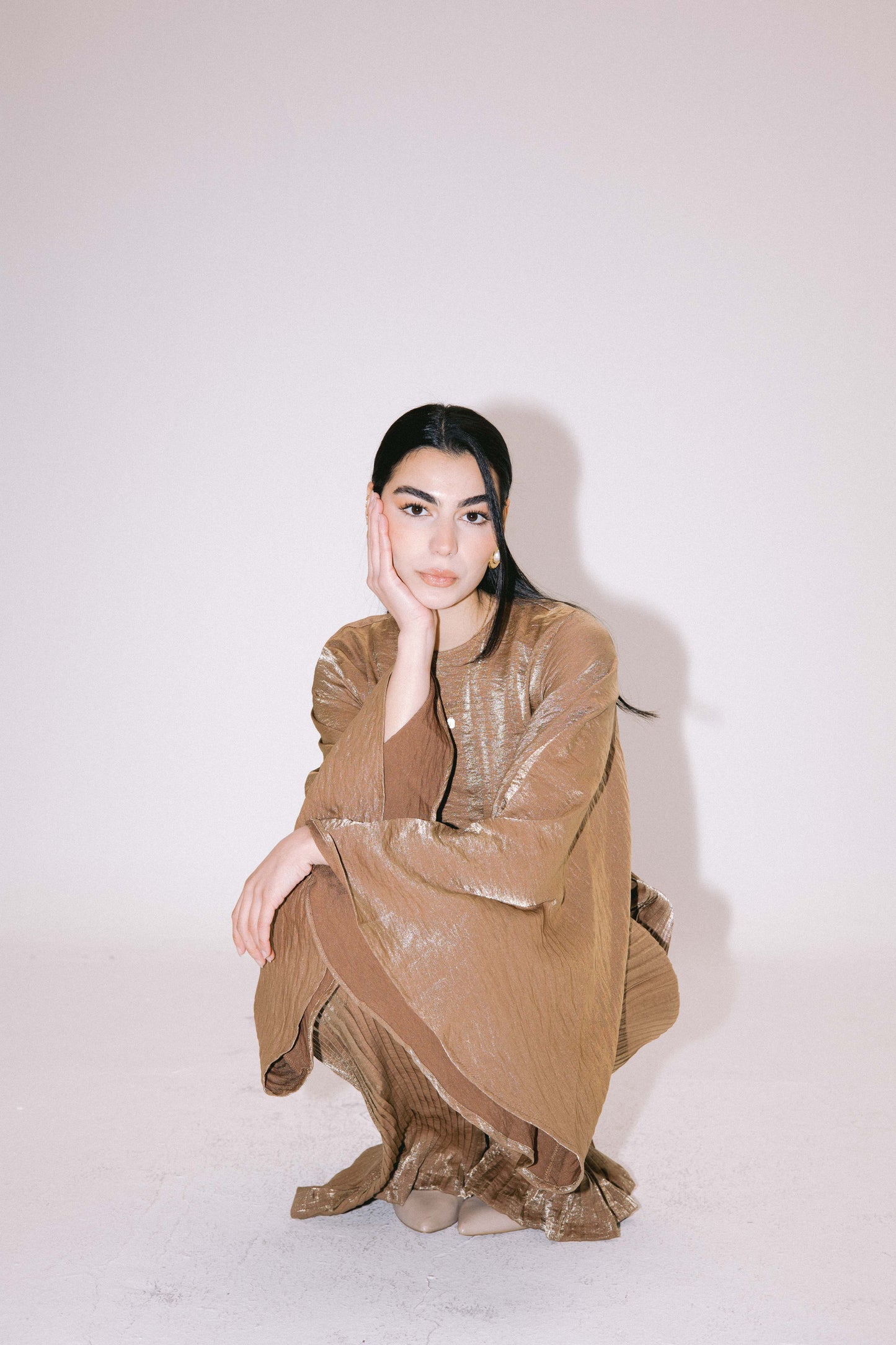 Glimmer Jumpsuit in Gold