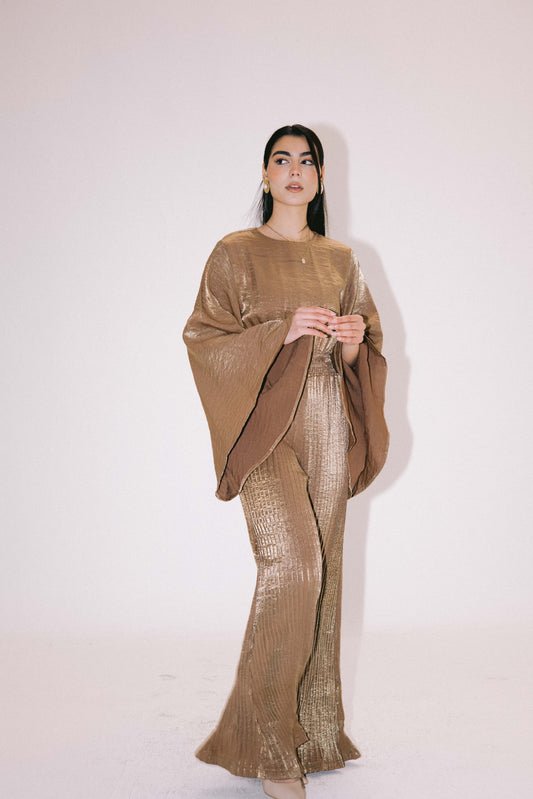 Glimmer Jumpsuit in Gold